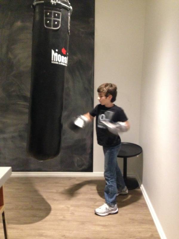 Declan working the bag in our hotel room.